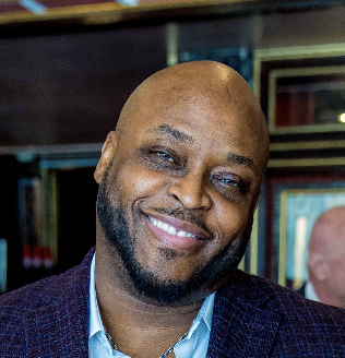 Azuka “Coach Zeke” Tuke