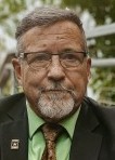 Dennis E Schroader